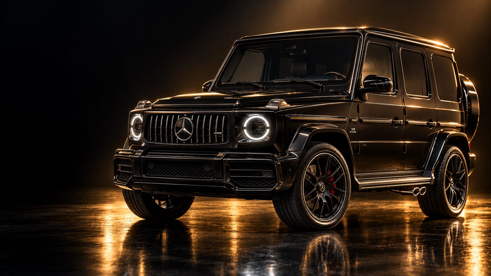 A black Mercedes-AMG G 63 on a dark studio floor