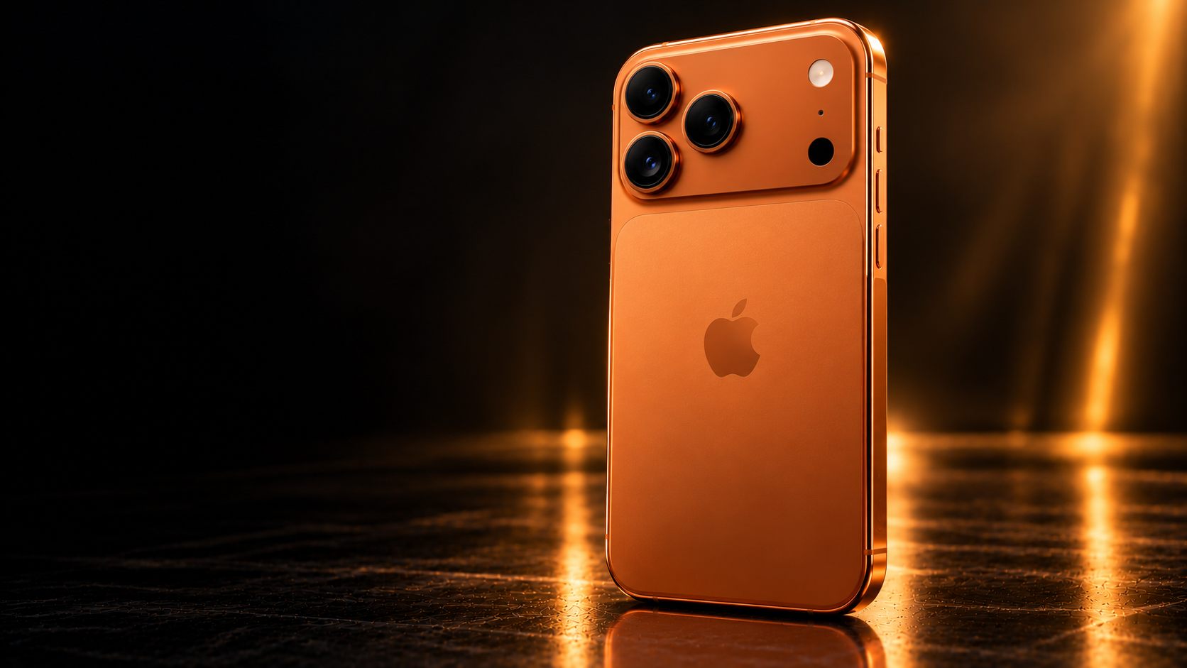 The back of an orange iPhone 17 Pro Max with its three cameras